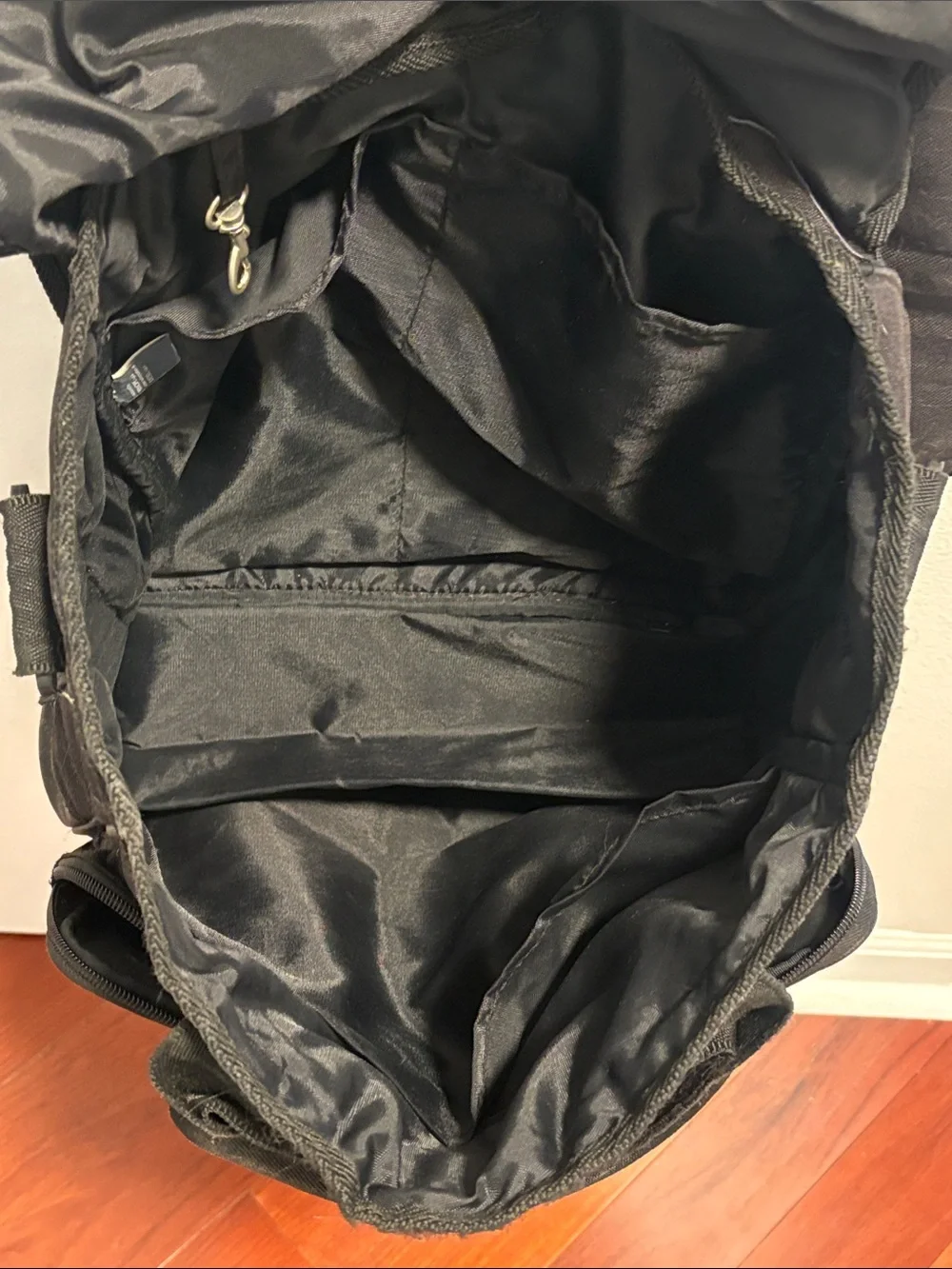 Diesel Vintage Black Canvas Backpack with Red Logo Accent.